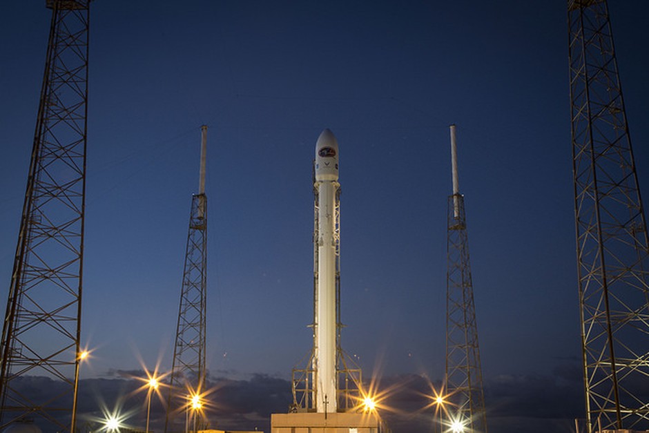 A rocket on the launch pad at dusk.